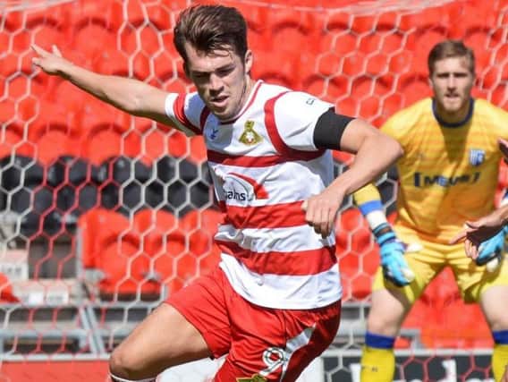 John Marquis scored Doncaster Rovers' first goal at Ewood Park