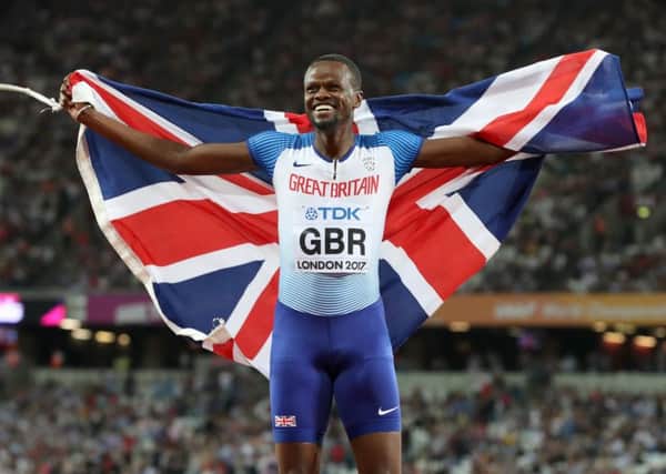 Great Britain's Rabah Yousif celebrates taking bronze in the Men's 4x400m relay final (Picture: Martin Rickett/PA Wire)