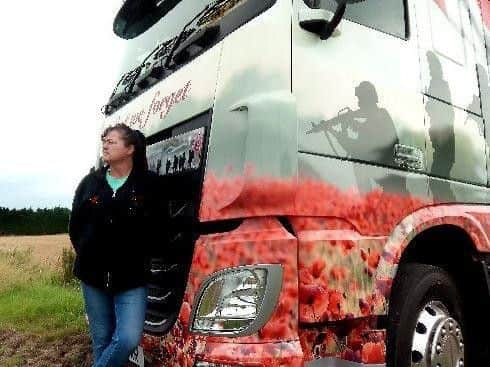 The Poppy Truck has been handsprayed with images from WW1 and WW2 as well as fields of wild poppies