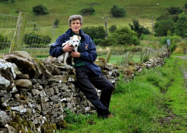 Alex Wilkes from Long Close Farm near Leyburn with her dog Jem. Pictures by Gary Longbottom.