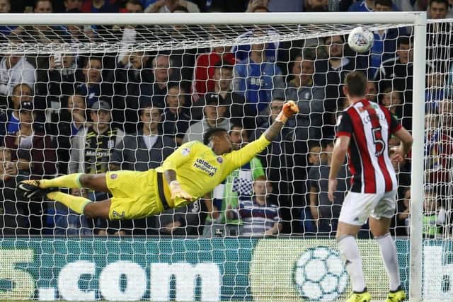 Jamal Blackman watches on as the ball finds the top corner (Photo: Sportimage)