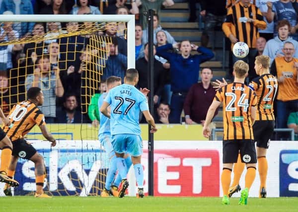 Michael Dawson nods home an equaliser for Hull City but they went on to suffer a 3-2 home defeat against Wolverhampton Wanderers last night (Picture: Danny Lawson/PA Wire).