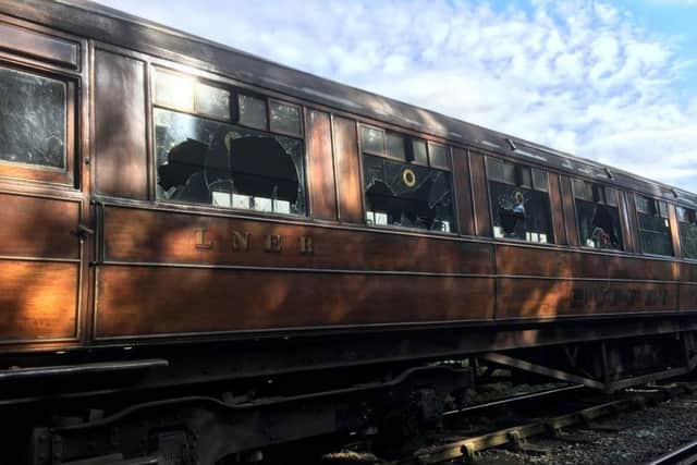 Picture issued by North York Moors Railway of one of a set of antique train carriages that were vandalised