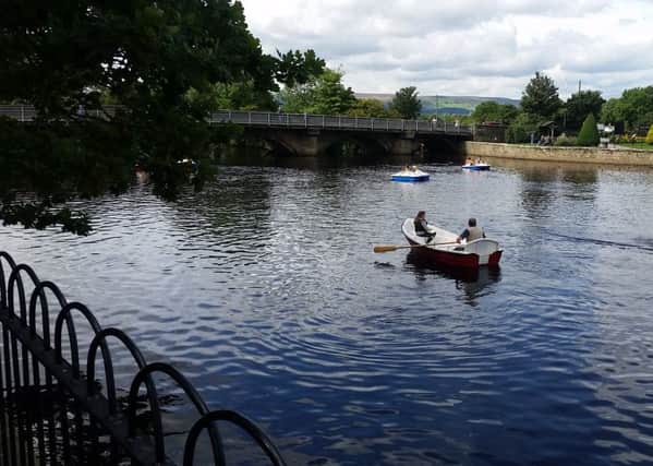 WATER TREAT: The river at Otley full of people in pedalos and rowing boats.