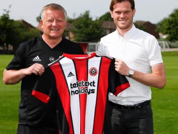 Chris Wilder with Richard Stearman, after his arrival at United.
