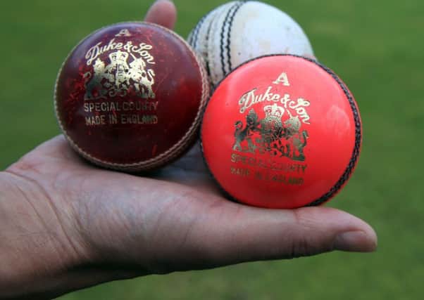 New balls please: The pink Dukes ball being used at Edgbaston.