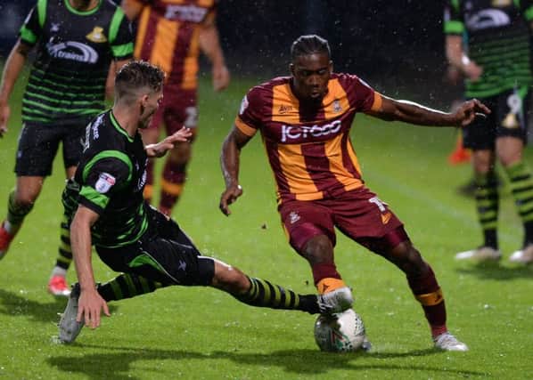 Making a mark: Joe Wright challenging Bradford's Dominic Poleon.
Picture: Bruce Rollinson