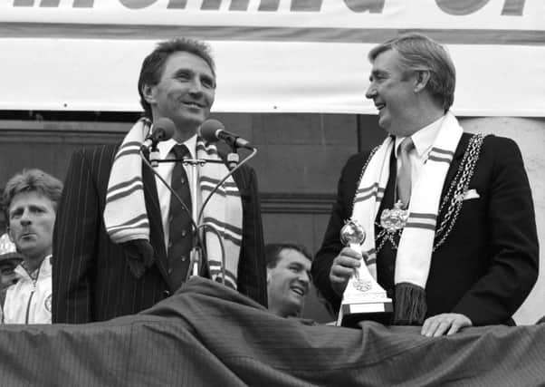 Last laugh: Leeds United manager Howard Wilkinson at a civic reception promotion party after early defeat at Newcastle