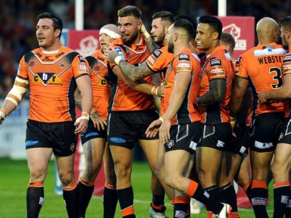 The Castleford's squad celebrate Mike McMeeken's try.