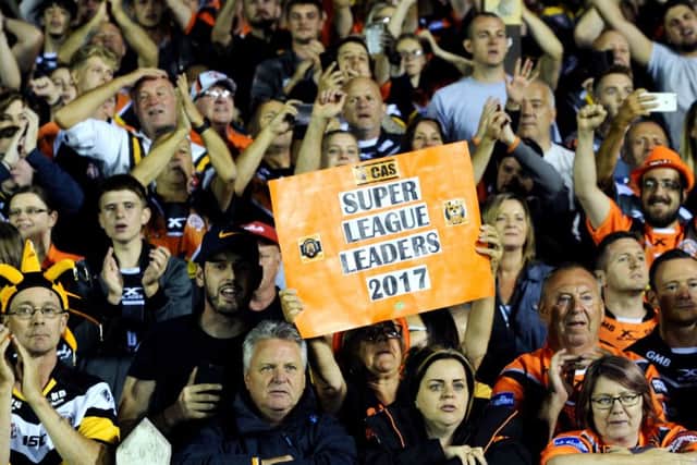 Castleford's fans celebrate the team winning the League Leaders Shield.
 (Picture: Jonathan Gawthorpe)