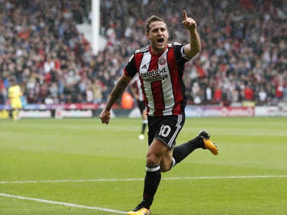 Billy Sharp celebrates scoring in the 17th minute for Blades (Photo: Sportsimage)