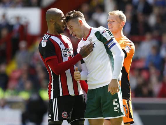 Angus MacDonald was sent off for aiming a headbutt at Sheffield United's Leon Clarke (Photo: Sportsimage)
