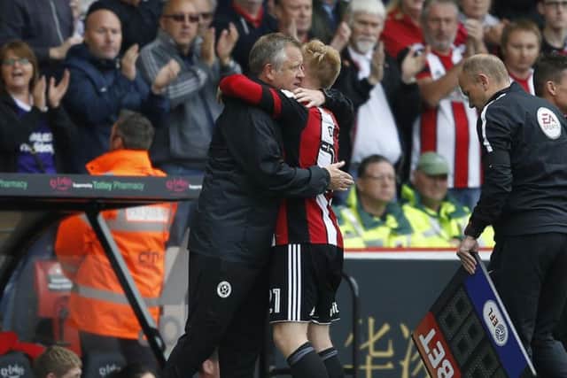 Chris Wilder shows his appreciation to Mark Duffy's performance (Photo: Sportimage)