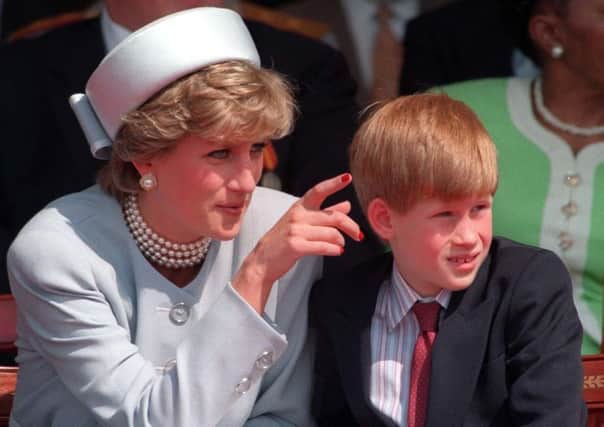 Diana, Princess of Wales with her son Prince Harry. Diana, Princess of Wales was a woman whose warmth, compassion and empathy for those she met earned her the description the "people's princess".  Martin Keene/PA Wire