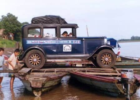 Have car, will travel: The Zapp family car crossing the Amazon on canoes, Santa Rosa, PerÃº.