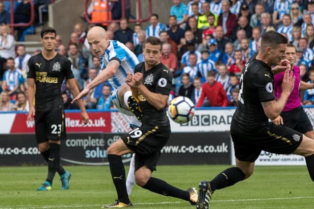 Picture perfect: 
Aaron Mooy scores his goal. (Picture: Tony Johnson)