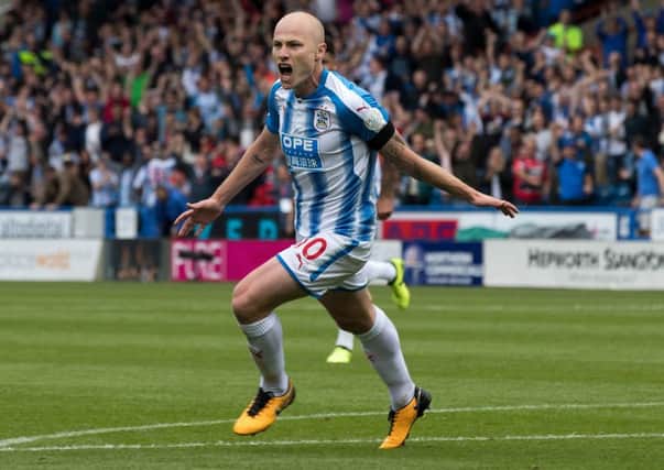 Aaron Mooy celebrates his goal against Newcastle. (Picture: Tony Johnson)