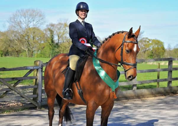 Showing the way: Kathryn Wheelock has been riding horses for 30 years despite having cerebral palsy and her determination and persistence now sees her heading to a prestigious first ever showing finals in Addington next month. Picture by SMR Photos. Other photos by Chris Lax photography.