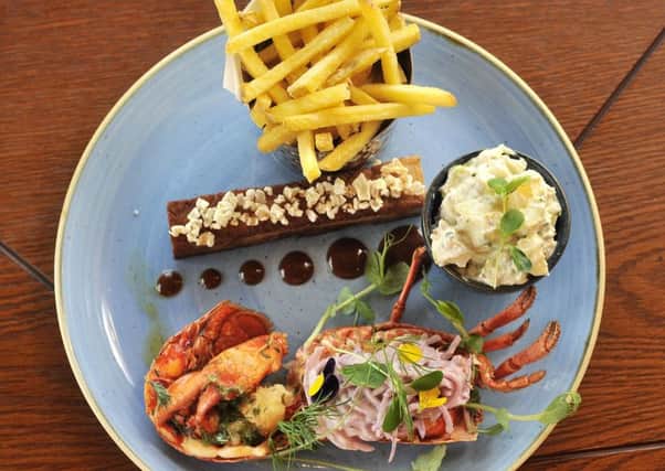 STAR IS BORN: Surf meets snout with belly pork and fresh lobster.