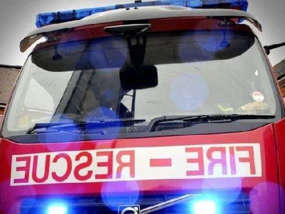 Firefighters are tackling a house fire in Bradford