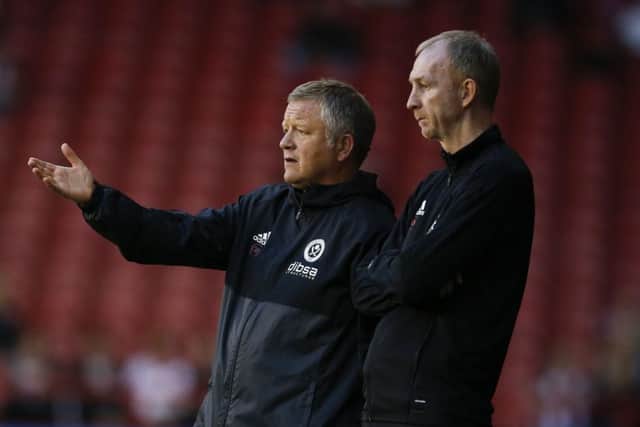Chris Wilder, left, and assistant Alan Knill at Bramall Lane, during Tuesday night's defeat to Leicester in the Carabao Cup. Picture: Simon Bellis/Sportimage