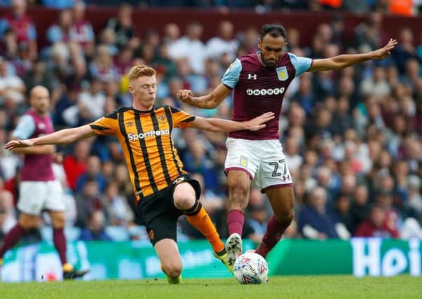 Aston Villa's Ahmed Elmohamady (right) in action with Hull City's Sam Clucas.