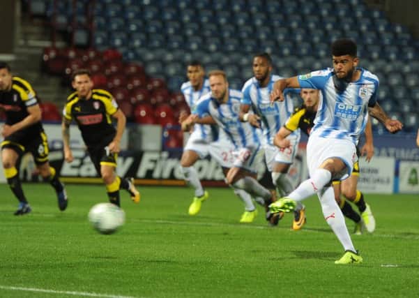 Huddersfield Town's Philip Billing scores from the penalty spot. Picture Tony Johnson.