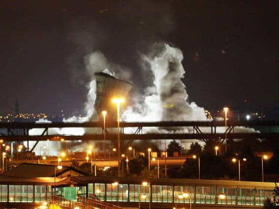 The towers come crashing down.