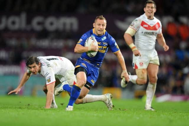 Rob Burrow darts in for the opening try for Leeds in the 2011 Grand Final win over St Helens. PIC: Steve Riding