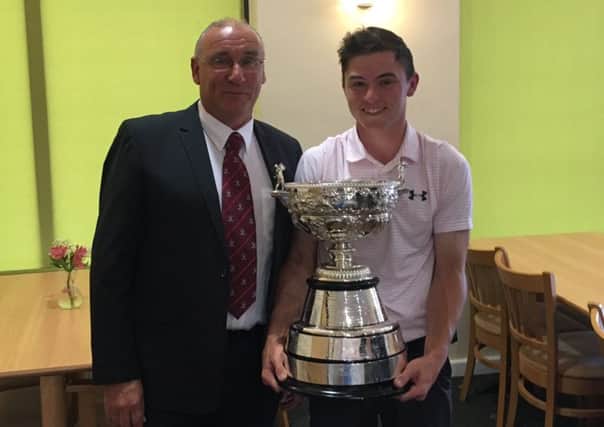 New Yorkshire men's amateur champion Alex Fitzpatrick with Cleveland honorary secretary Frank Spenceley (Picture: Courtesy of Cleveland GC).