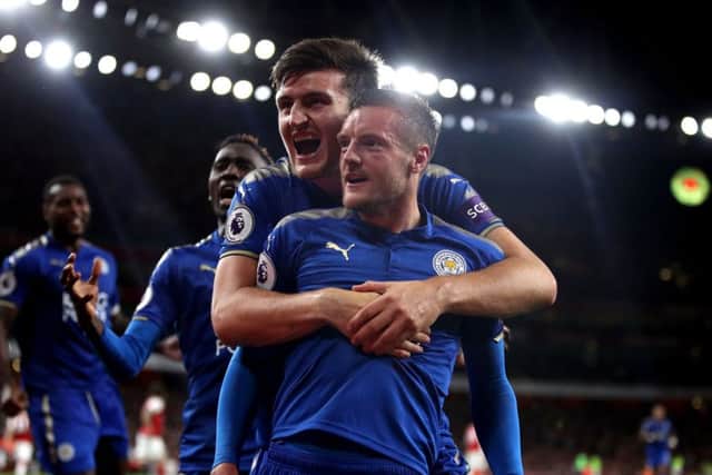 Harry Maguire,celebrates a goal at  Arsenal with Leicester City team-mate Jamie Vardy Picture: Nick Potts/PA.