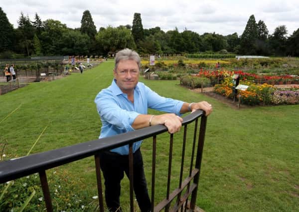 TV gardener Alan Titchmarsh is opposing plans to fell trees at RHS Wisley to make way for motorway improvements.