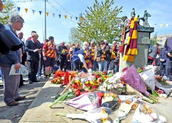 A memorial service in Centenary Square, Bradford, on the 32nd anniversary of the Bradford City fire at Valley Parade.  Picture Tony Johnson.