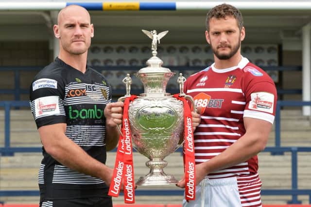 Gareth Ellis and Sean O'Loughlin with the Challenge Cup trophy at Headingley earlier this week. Picture: Bruce Rollinson.