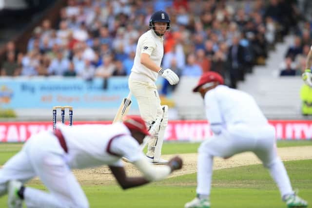 England's Jonny Bairstow is caught in the slips by West Indies Jason Holder during the second Investec Test match at Headingley. Picture: Nigel French/PA