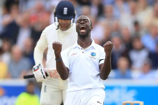 West Indies Kemar Roach celebrates the wicket of England's Mark Stoneman. Picture: Nigel French/PA