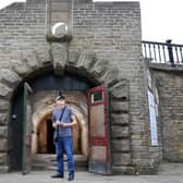 Les Brook, Saltaire History Club member in a  tunnel by Salts Mill. PIC: Tony Johnson
