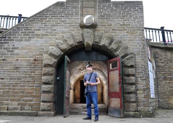 Les Brook, Saltaire History Club member in a  tunnel by Salts Mill. PIC: Tony Johnson