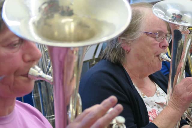 Judith Dower and Dorothy Guy (right) practise tenor horn.