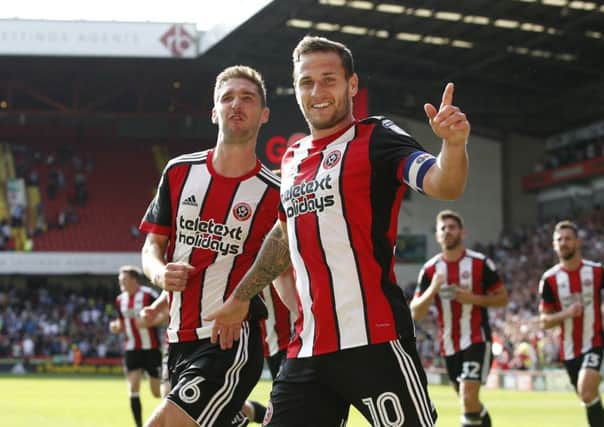 On target: Billy Sharp celebrates his second goal.