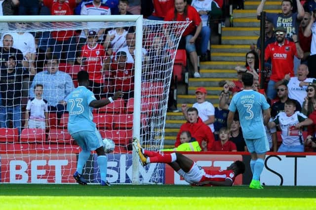 On target: Ike Ugbo nets for Barnsley against Sunderland.