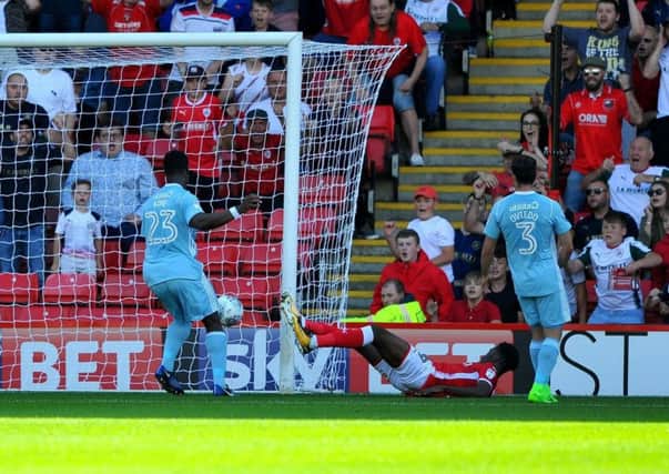 On target: Ike Ugbo nets for Barnsley against Sunderland.