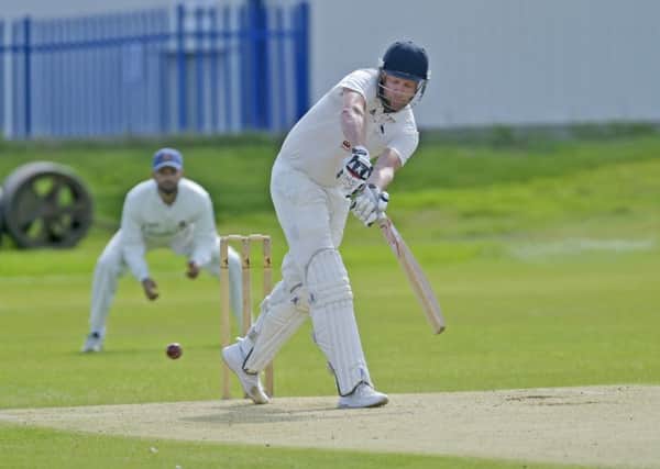 In the runs: Nick Connolly on his way past 1,000 runs for Hanging Heaton.
Picture: Steve Riding