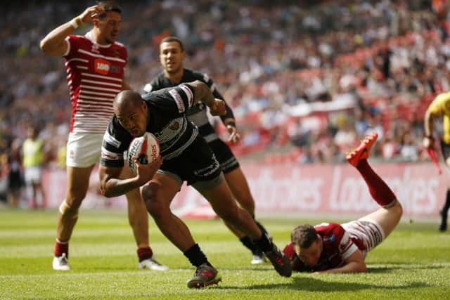 Hull FC's Fetuli Talanoa claims the high ball to score their first try