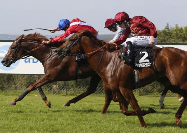 Lightning Spear (right) and Oisin Murphy win The Grosvenor Sport Celebration Mile Stakes Race run at Goodwood (Picture: Julian Herbert/PA Wire)