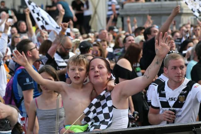 Hull FC fans line the streets.