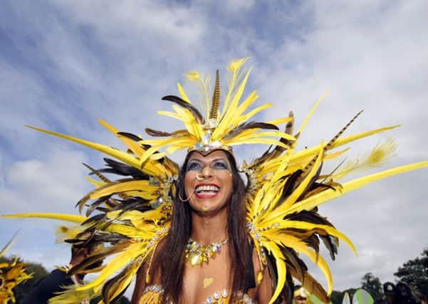 Nisha Pankhania takes part in the Leeds West Indian Carnival's 50th anniversary parade. Pictures: Simon Hulme