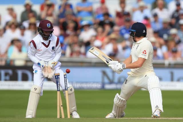 Jonny Bairstow is bowled by West Indies' Roston Chase after a reverse sweep shot went wrong on day four at Headingley. Picture: Nigel French/PA