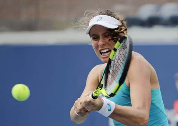 Johanna Konta returns a shot against Serbia's Aleksandra Kruni at Flushing Meadow, but she was to later suffer a shock first round defeat. Picture: AP/Frank Franklin II.
