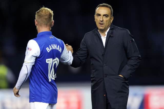 Staying put?: Owls coach Carlos Carvalhal  is determined to keep Barry Bannan.
Picture: Steve Ellis